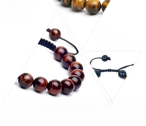 Macro detail of 10mm natural tiger eye stone beads and black hand-woven adjustable cord