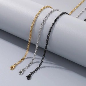 Detailed view of woven hip hop chains in gold, silver and black stainless steel