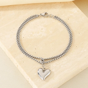 Detail of silver heart pendant on double-layer box chain with lobster clasp