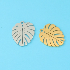 Polished gold and silver monstera leaf charms for DIY stainless steel jewelry making