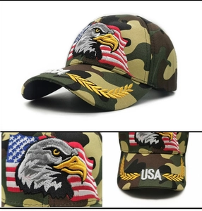 Detail of eagle and USA flag embroidery on a camouflage baseball cap with golden wheat ears