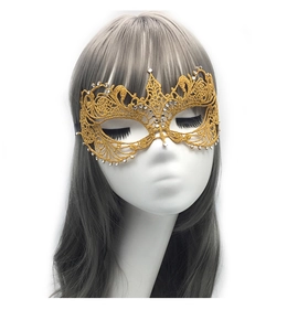 Detailed view of golden lace masquerade mask with sparkling rhinestones on model head