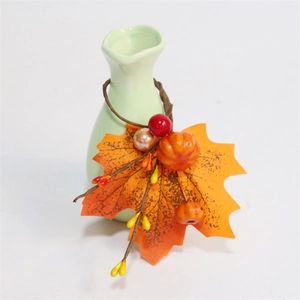 Halloween napkin ring with maple leaves, pumpkin and berries for Thanksgiving decor