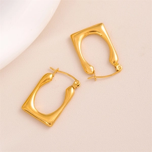 Minimalist gold U-shaped geometric hoop earrings in polished stainless steel for women