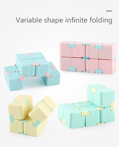 Detail of macaron infinity cubes showing multiple colors and variable folding shapes