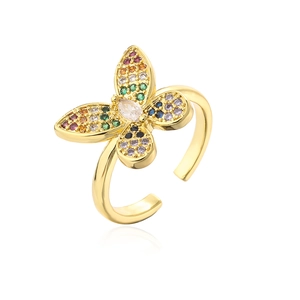 Detail of gold butterfly ring with colorful rainbow zircons and adjustable open band