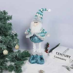 Detail of telescopic Christmas plush gnome standing in a snowy winter holiday scene