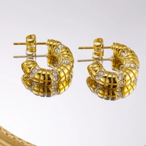 Golden stainless steel C-shaped earrings with spiral texture and clear zircon stones