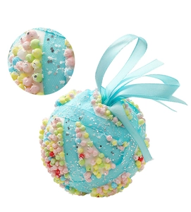 Detail of 8cm macaron blue Christmas ball with colorful foam beads and snowflake glitter