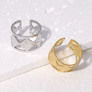 Textured stainless steel adjustable rings with geometric triangles in gold and silver