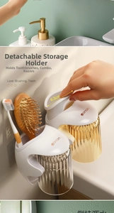 Dettaglio del portaspazzolino a parete con tazze rimovibili e sistema di drenaggio