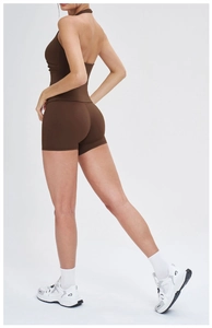 Detail of dark brown racerback sports top and high waist shorts set for yoga training