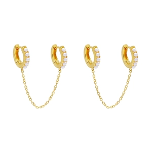 Detail of 18K gold plated double stud earrings with pearl accents and fine gold link chain
