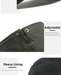 Detail of adjustable metal buckle and thick fleece lining on black flat top winter cap