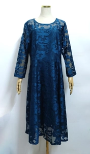 Detail of elegant navy blue floral lace pattern and hollow texture on long sleeve dress
