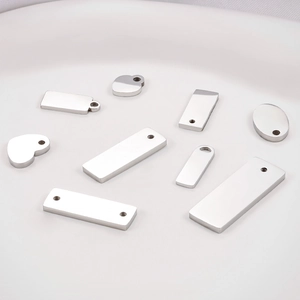 Polished stainless steel jewelry tags in heart, oval, and rectangle shapes for DIY