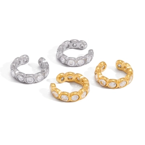 Set of four gold and silver ear cuffs featuring white cubic zirconia in stainless steel