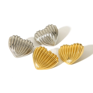 Vertical striped heart-shaped stud earrings in polished gold and silver stainless steel