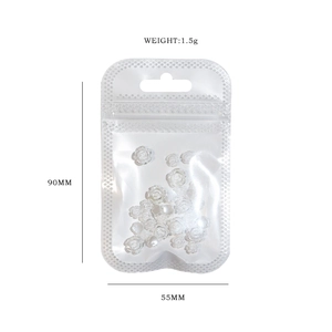 3D white camellia flower nail charms with aurora effect in a 90x55mm packaging
