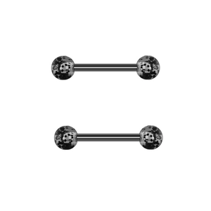 Detailed view of black and grey textured spider nipple rings on a clean white background