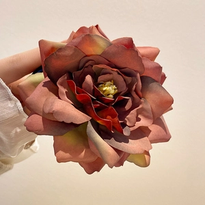 Elegant Phalaenopsis orchid hair claw in gradient rusty red fabric for women's updos