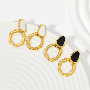 Vintage gold plated stainless steel drop earrings in black and white enamel finish