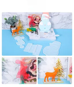 Macro view of Christmas themed silicone resin molds including Santa and reindeer shapes