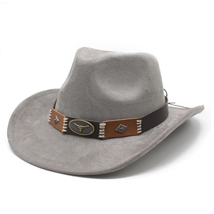 Detail of grey suede cowboy hat featuring a leather band with metal bull head emblem
