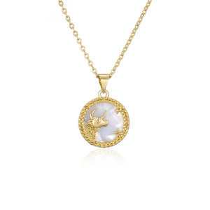 Detailed shot of Taurus zodiac necklace with gold plating and colorful zircon inlay
