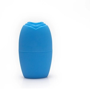 Close-up of blue silicone face ice roller with textured rose bud tip on a white background