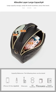 Internal view of black quilted bag showing double compartments and zipper pocket storage