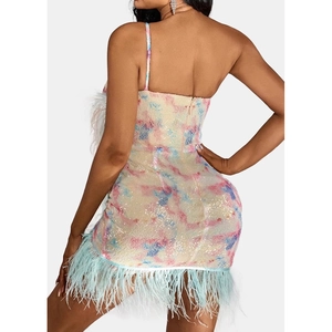 Detail of sequin party dress back with zipper and light blue ostrich feather trim