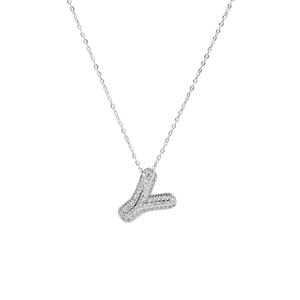 Macro shot of silver bubble letter Y pendant with micro-pave cubic zirconia stones