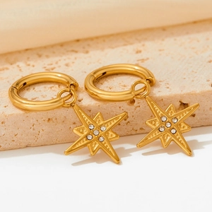 Golden octagonal star hoop earrings with zircon stones and polished stainless steel finish