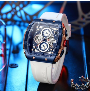 Macro shot of CURREN chronograph watch dial with blue case and white silicone strap
