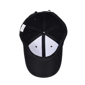 Detail view of cotton baseball cap interior showing stitching and care label