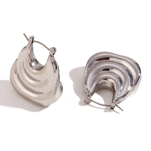 Three-layer wavy hollow earrings in silver finish with secure hoop closure for women