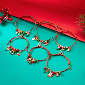 Handmade woven Christmas bracelet set with Santa, tree, and reindeer charms for women
