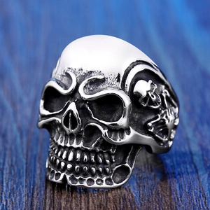 Close-up of gothic skull ring in stainless steel with vintage oxidized finish and fine details