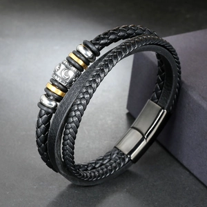 Multilayer black woven leather bracelet with moon engraved beads and magnetic clasp