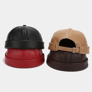 Minimalist PU leather docker caps in black, red, khaki, and brown with metal buckle