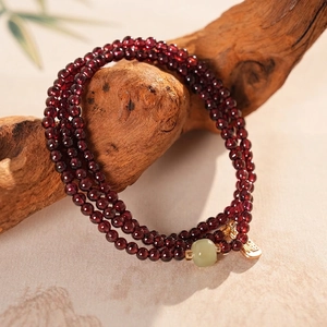 Vintage red garnet beaded triple-layer bracelet with jade and gold blessing charm