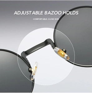 Detail of adjustable silicone nose pads on retro round metal steampunk sunglasses