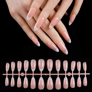 French tip press-on nails in nude pink and white almond shape displayed on set