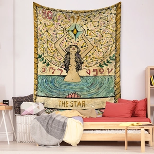 Detail of The Star tarot card tapestry with bohemian celestial art on a bedroom wall