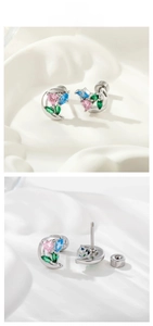 Detail of crescent moon ear stud with pink heart zircon and secure screw-back closure