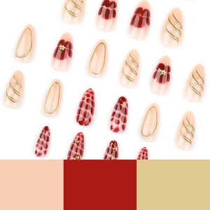 Short almond press-on nails set with burgundy petals, 3D gold lines, and leopard prints
