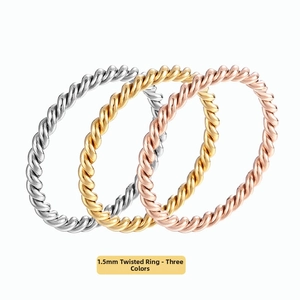 Detail showing three 1.5mm twisted rope rings in silver, gold, and rose gold finish