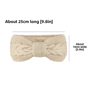 Detail view of cream cable-knit headband with soft fleece lining, 25cm by 10cm