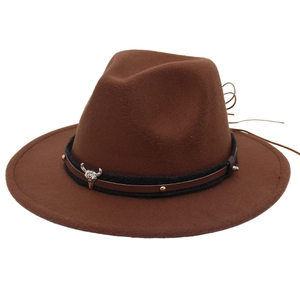 Detailed view of the brown wool fedora hat with metal bull head buckle and studs